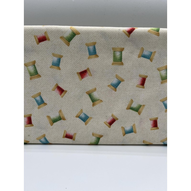 TISSU MOTIF BOBINES DE COULEUR